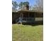 Cozy screened-in back porch with wooden railings and stairs leading to the yard at 4001 W Antioch Dr, Oxford, NC 27565