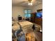 Cozy bedroom featuring neutral tones, a ceiling fan, and a large window for natural light at 4001 W Antioch Dr, Oxford, NC 27565