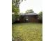 Brick front exterior featuring a covered entrance with steps at 4001 W Antioch Dr, Oxford, NC 27565
