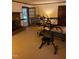 Inviting living area with fireplace, wood floors, and glass doors, offering a bright atmosphere at 4001 W Antioch Dr, Oxford, NC 27565