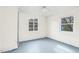 Inviting bedroom featuring neutral walls, painted floors, and ample natural light at 415 Estell St, Rocky Mount, NC 27803