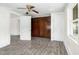 Bright bedroom with wood-look floors, neutral walls, and a ceiling fan at 415 Estell St, Rocky Mount, NC 27803
