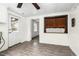 Bright kitchen featuring gray floors, a doorway, and a window at 415 Estell St, Rocky Mount, NC 27803