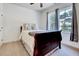Comfortable bedroom with a queen bed and bright natural light at 44 Grandwood Cir, Durham, NC 27712