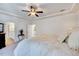 Inviting main bedroom with a view into the en-suite bath at 44 Grandwood Cir, Durham, NC 27712