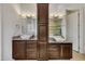 Bathroom featuring double sink vanity with granite countertops and a walk-in shower at 45 Calabria Ct, Clayton, NC 27527