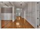 Elegant foyer featuring hardwood floors, detailed moldings, and offering a welcoming entrance into the home at 45 Calabria Ct, Clayton, NC 27527