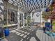The Backyard deck features a pergola and manicured flower garden at 49 Everwood Dr, Four Oaks, NC 27524
