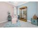 Comfortable bedroom with unique decor and a display cabinet at 49 Everwood Dr, Four Oaks, NC 27524