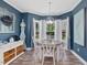 Dining room with bay window and hardwood flooring at 49 Everwood Dr, Four Oaks, NC 27524