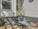 Manicured landscaping featuring rock beds and a small tree at 49 Everwood Dr, Four Oaks, NC 27524