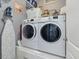Functional laundry room with modern washer and dryer units at 49 Everwood Dr, Four Oaks, NC 27524