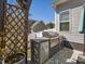 Outdoor kitchen featuring a stainless steel grill and countertop at 49 Everwood Dr, Four Oaks, NC 27524