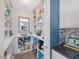 Organized walk-in pantry with ample shelving and storage space at 49 Everwood Dr, Four Oaks, NC 27524
