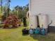 Rain barrels are installed to provide sustainable irrigation of the gardens at 49 Everwood Dr, Four Oaks, NC 27524