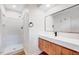Contemporary bathroom with a walk-in shower, modern vanity, and updated fixtures at 500 W Woodcroft Pkwy, Durham, NC 27713