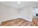 Spacious bedroom with hardwood floors and closet at 500 W Woodcroft Pkwy, Durham, NC 27713