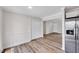 Bright living room with wood floors, closet, and entrance, offering a welcoming space at 500 W Woodcroft Pkwy, Durham, NC 27713