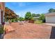 Large brick patio with outdoor seating, ideal for enjoying the backyard at 504 W Brocklyn St, Benson, NC 27504