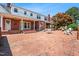 Expansive brick patio perfect for outdoor entertaining and relaxation at 504 W Brocklyn St, Benson, NC 27504