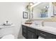 Bathroom featuring modern vanity and neutral color scheme at 504 W Brocklyn St, Benson, NC 27504
