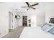 Spacious bedroom featuring a TV, bookshelf, neutral walls and carpet at 504 W Brocklyn St, Benson, NC 27504