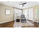 Bedroom featuring hardwood floor, neutral color scheme, and ceiling fan at 504 W Brocklyn St, Benson, NC 27504