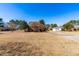 Charming brick home with a well-maintained lawn and a detached garage at 504 W Brocklyn St, Benson, NC 27504