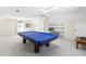 Upstairs game room with plush carpet, natural light, and space for recreation at 504 W Brocklyn St, Benson, NC 27504