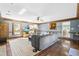 Inviting living room featuring hardwood floors, a comfortable sofa, and a view into the dining area at 504 W Brocklyn St, Benson, NC 27504