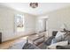 Inviting living room with hardwood floors, neutral decor, and ample natural light at 504 W Brocklyn St, Benson, NC 27504