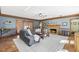 Cozy living room boasts hardwood floors, a fireplace, and comfortable seating for relaxing or entertaining at 504 W Brocklyn St, Benson, NC 27504