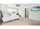 Serene main bedroom with carpet, a TV, natural light, and a neutral color palette at 504 W Brocklyn St, Benson, NC 27504