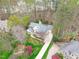 Overhead view of the home and surrounding greenery showing the driveway at 506 Rose Point Dr, Cary, NC 27518