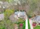 Stunning aerial view of the home showcasing its sprawling layout and well-maintained grounds at 506 Rose Point Dr, Cary, NC 27518