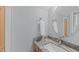 Bathroom features a stylish granite countertop, white sink, and modern fixtures at 506 Rose Point Dr, Cary, NC 27518