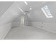 Finished bonus room with skylight, recessed lighting, and neutral carpeting at 506 Rose Point Dr, Cary, NC 27518