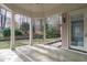Covered patio provides a relaxing outdoor space with stone flooring and a scenic view at 506 Rose Point Dr, Cary, NC 27518