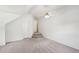Bright bedroom with neutral carpeting, large closet, and a ceiling fan at 5144 Pinehall Wynd, Raleigh, NC 27604