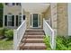 Stairway leading to a welcoming front door at 5144 Pinehall Wynd, Raleigh, NC 27604