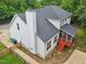 Aerial view of a two-story home featuring a screened-in porch and a fenced-in yard at 5144 Pinehall Wynd, Raleigh, NC 27604