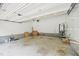 Spacious garage with high ceilings and ample storage space at 5144 Pinehall Wynd, Raleigh, NC 27604