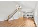 Spacious living area with stairs leading to a second-floor landing at 5144 Pinehall Wynd, Raleigh, NC 27604
