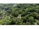 New construction nestled among mature trees in a residential neighborhood at 5205 Quail Meadows Dr, Raleigh, NC 27609