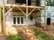 A walk out basement with full light windows and a door at 5205 Quail Meadows Dr, Raleigh, NC 27609
