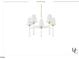 Elegant chandelier with white shades and gold accents, adding a touch of sophistication to any dining space at 5205 Quail Meadows Dr, Raleigh, NC 27609
