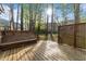 Backyard deck featuring a built in bench at 5301 Tilford Ln, Raleigh, NC 27613