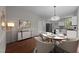 Elegant dining room adjacent to the kitchen, perfect for entertaining and Gathering meals at 5301 Tilford Ln, Raleigh, NC 27613