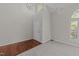 Bright foyer featuring hardwood floors, carpet, and a stylish light fixture above at 5301 Tilford Ln, Raleigh, NC 27613