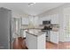 Well-equipped kitchen featuring stainless steel appliances and a convenient center island at 5301 Tilford Ln, Raleigh, NC 27613